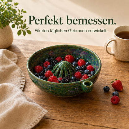 The original, handcrafted bowl with a swirling berry design – twisted, functional ceramic art