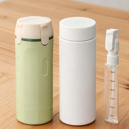 🧴4-in-1 Travel Dispenser Bottles