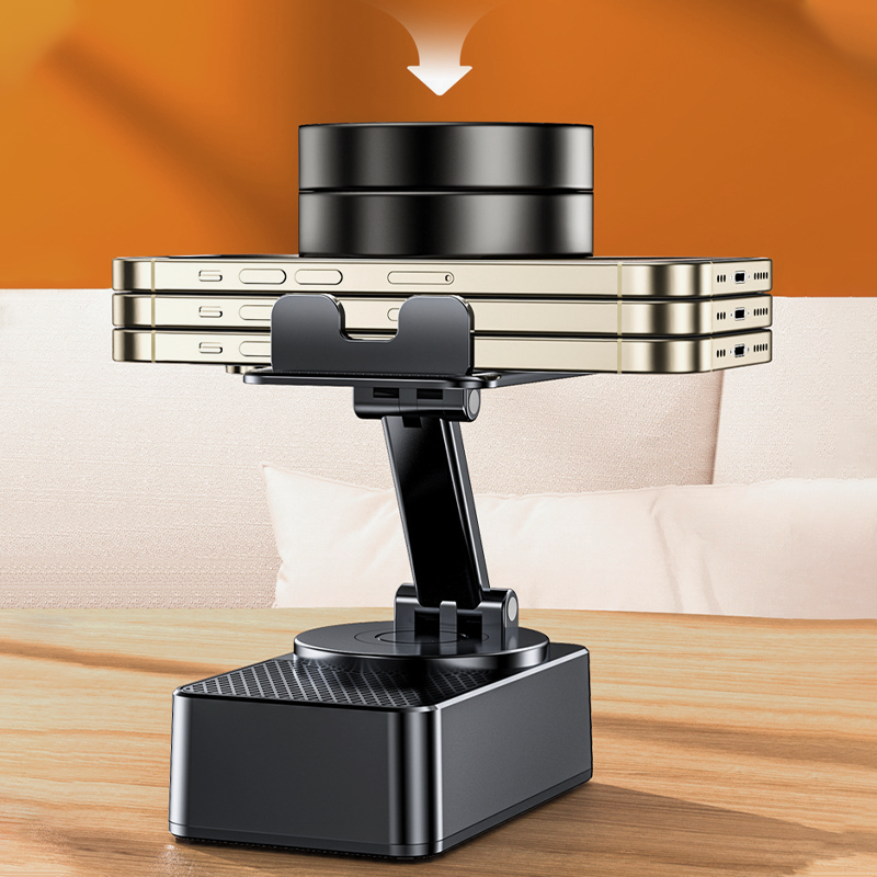 📱3-in-1 phone holder with Bluetooth speaker and power bank